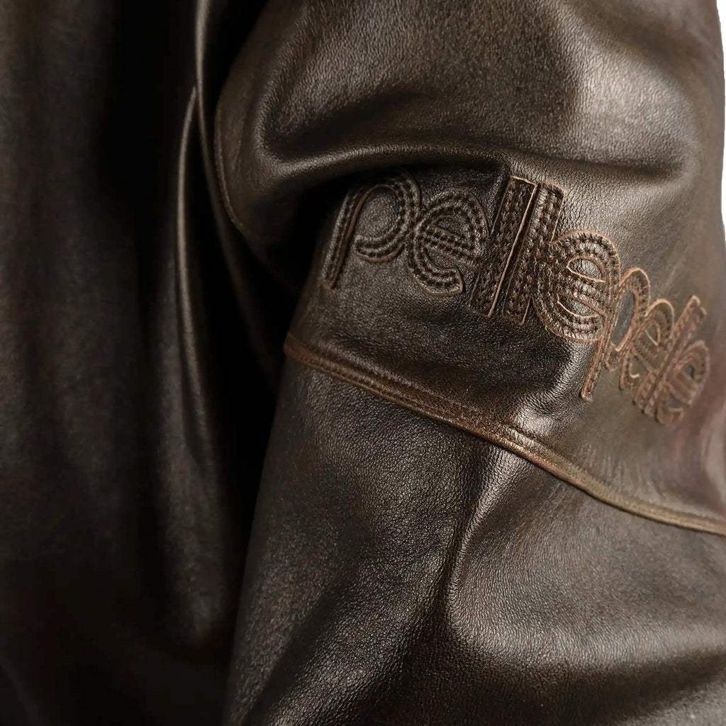 Blouson en cuir vieilli poncé pour homme