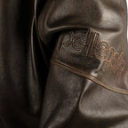 Blouson en cuir vieilli poncé pour homme