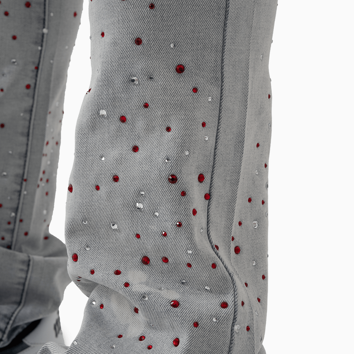 Pantalón vaquero de hombre con piedra rosa