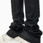 Pantalón de mezclilla negro para hombre con adornos de Icon