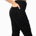 Pantalones vaqueros de mujer de tiro alto con efecto rasgado y apilado
