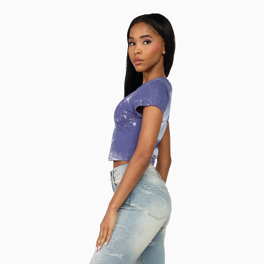 Conjunto de crop top con pedrería y jeans apilados para mujer