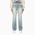 Conjunto de crop top con pedrería y jeans apilados para mujer