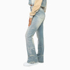 Conjunto de crop top con pedrería y jeans apilados para mujer