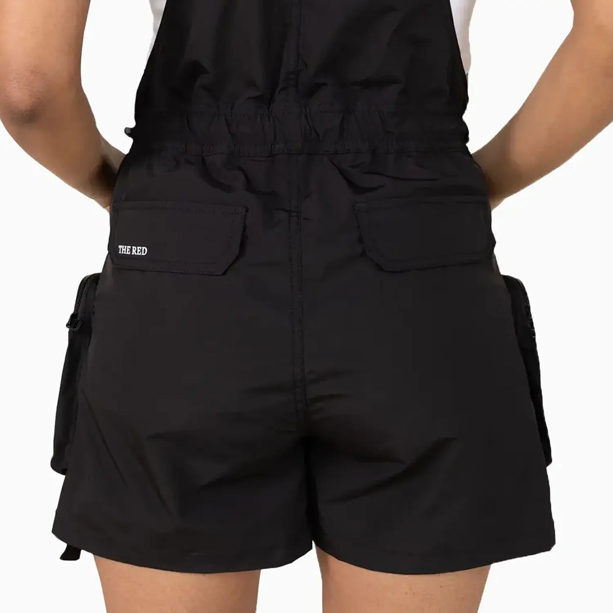 Combinaison-short coupe-vent utilitaire pour femme