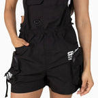 Combinaison-short coupe-vent utilitaire pour femme